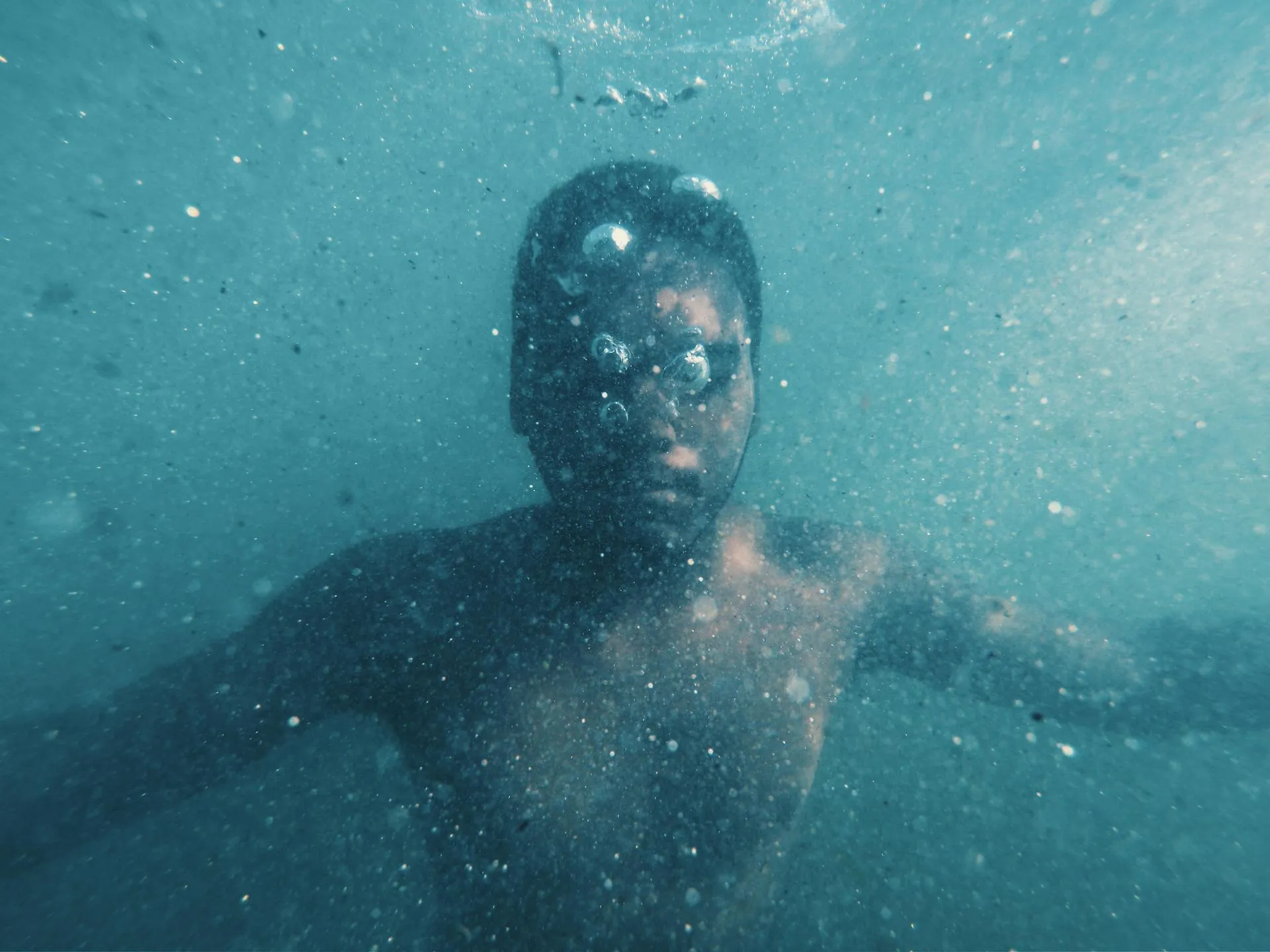 Person swimming under water