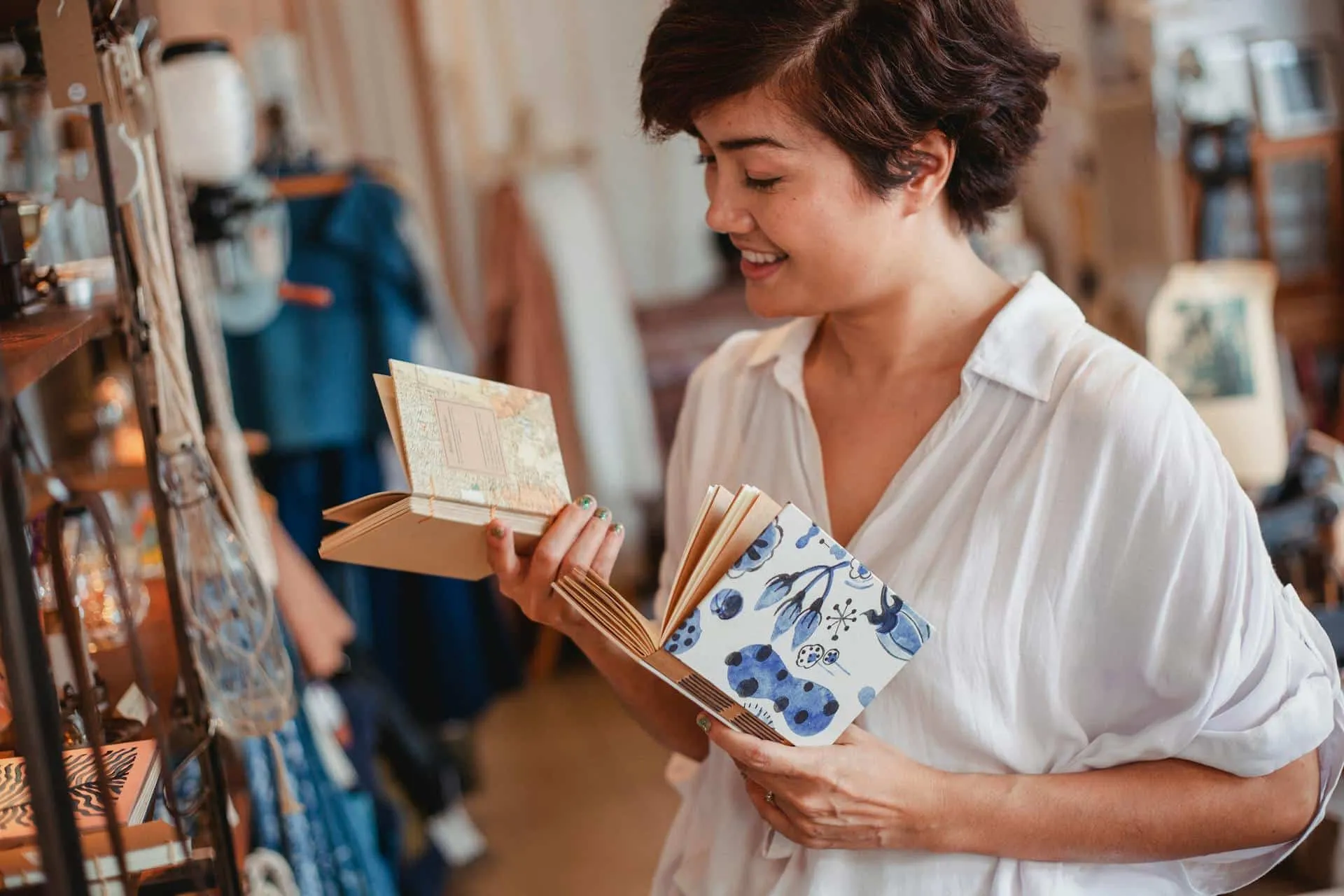 Woman browsing boutique store for handcrafted goods